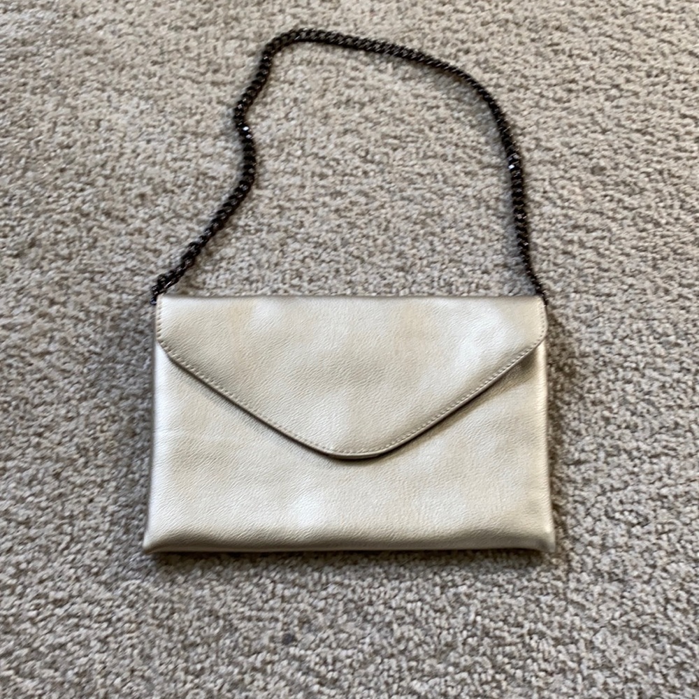 Jcrew gold envelope clutch with strap.